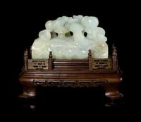 A Celadon Jade Carving Height 2 1/8 x length 3 3/4 x width 1 5/8 inches.