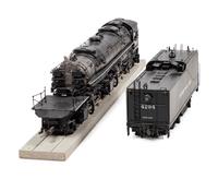 An Accucraft Polychrome 1-Gauge Southern Pacific Lines 2-8-8-4 Locomotive and Tender