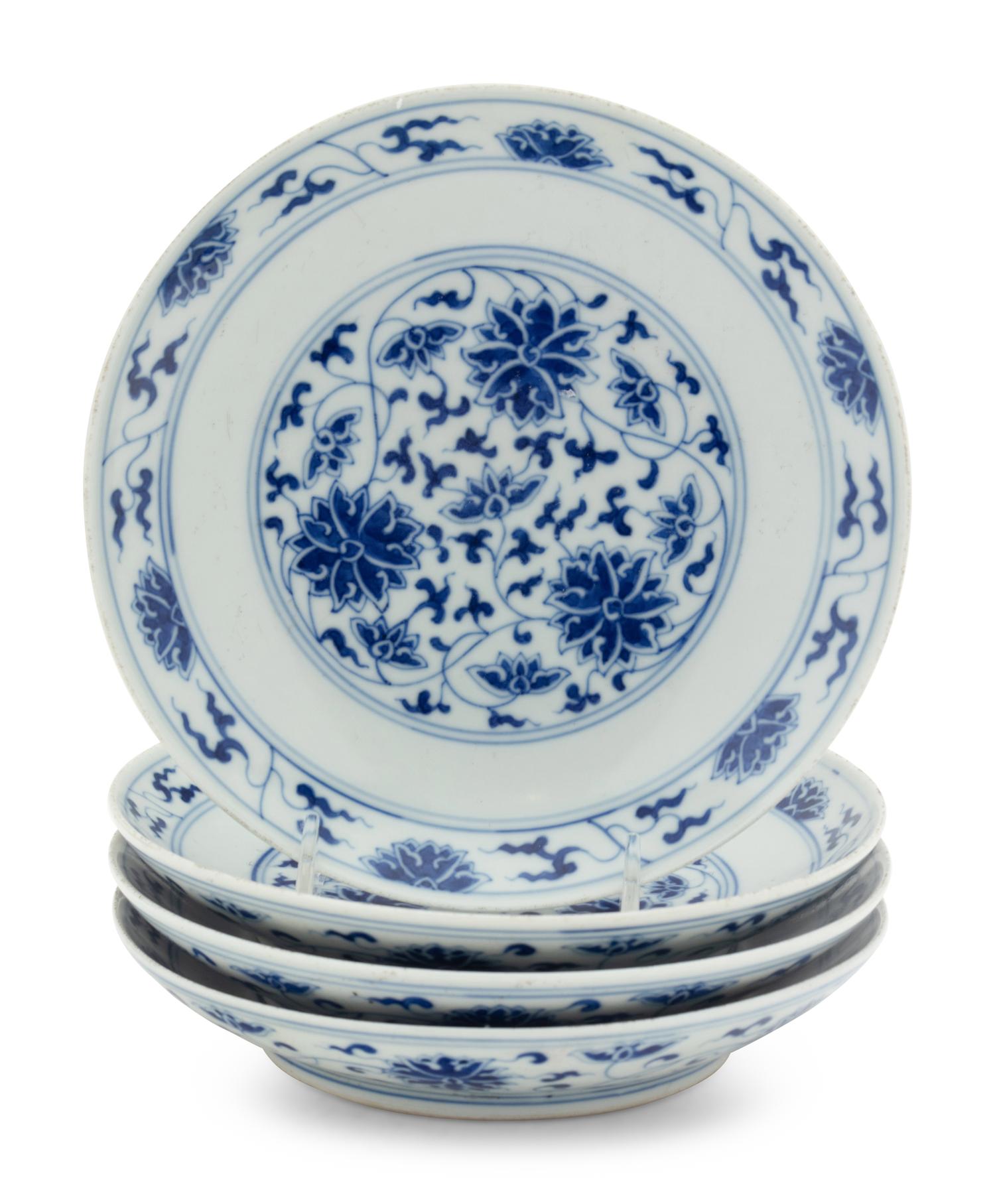 Four Chinese Blue and White Porcelain 'Lotus' Plates