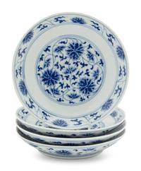 Four Chinese Blue and White Porcelain 'Lotus' Plates