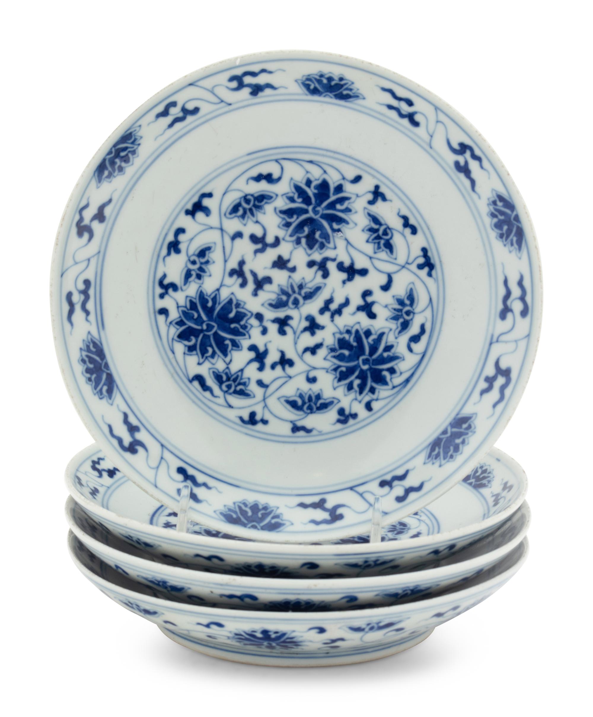 Four Chinese Blue and White Porcelain 'Lotus' Plates