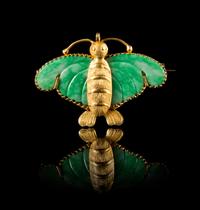 A Jadeite and Gold Mounted 'Butterfly' Brooch Length 1 1/2 inches.