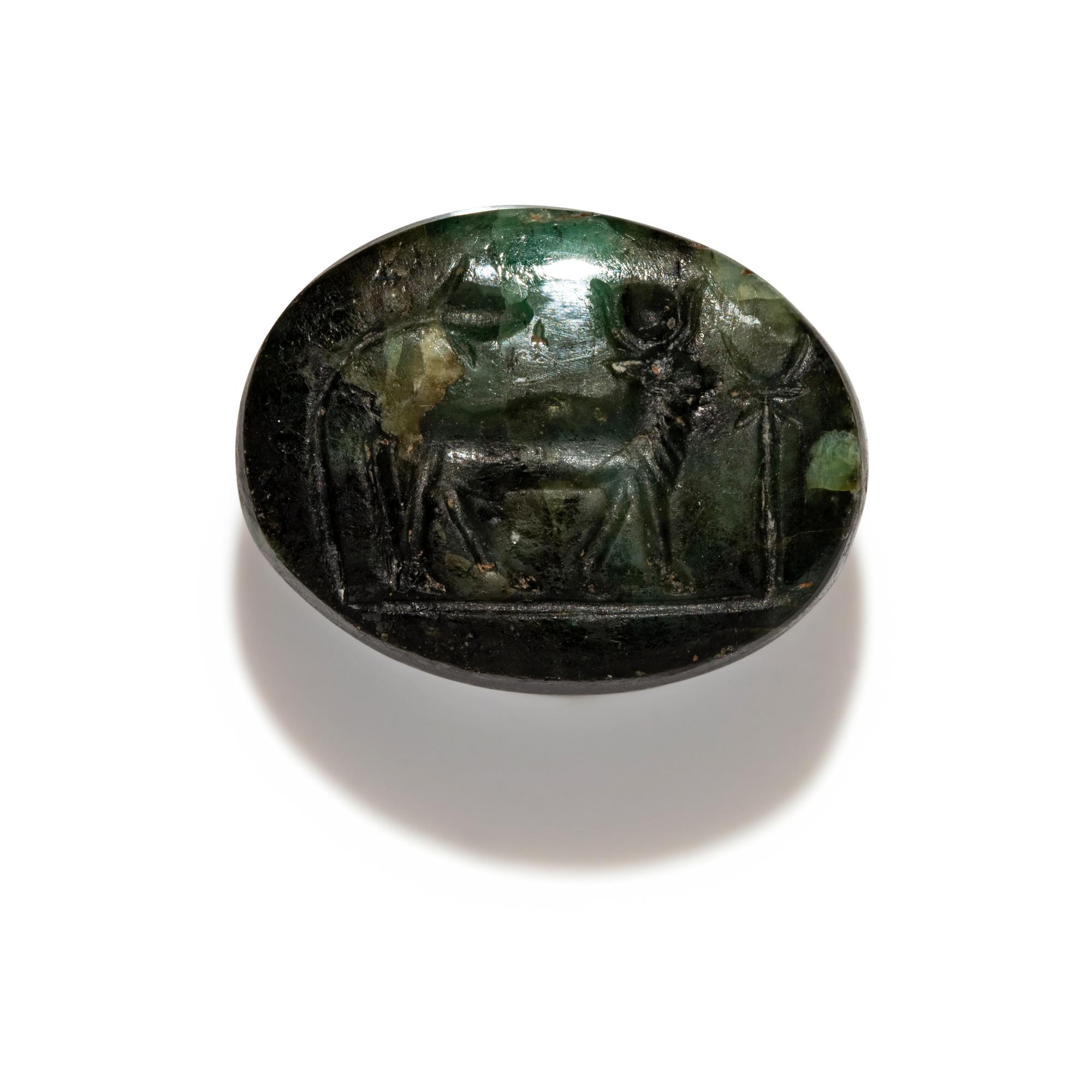 A Phoenician Green Serpentine Scaraboid with the Apis Bull