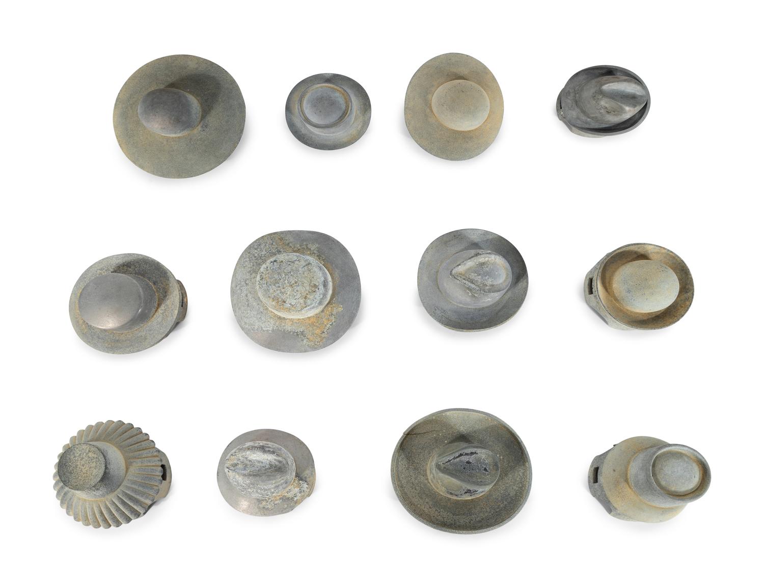 A Set of Twelve French Lead Hat Blocks