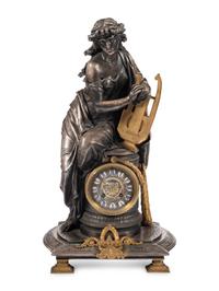 A French Gilt Bronze and Cast Metal Figural Clock