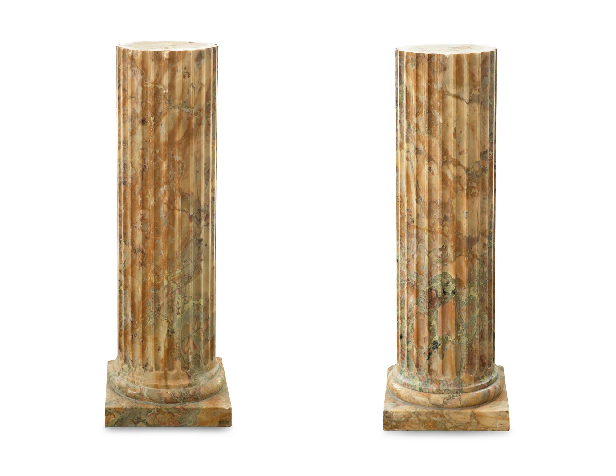 A Pair of Continental Fluted Marble Pedestals