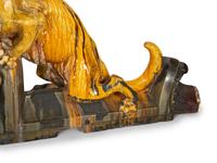 A Pair of Continental Glazed Terra Cotta Fox Roof Ornaments