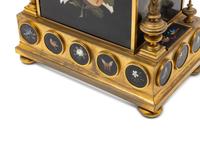 A French Gilt Bronze and Pietra Dura Mantel Clock