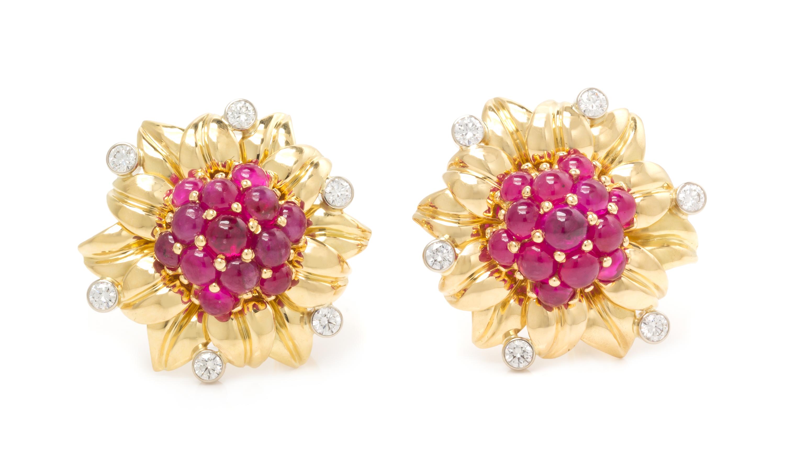 A Pair of 18 Karat Bicolor Gold, Ruby and Diamond Earclips, Aletto Brothers, 17.80 dwts.