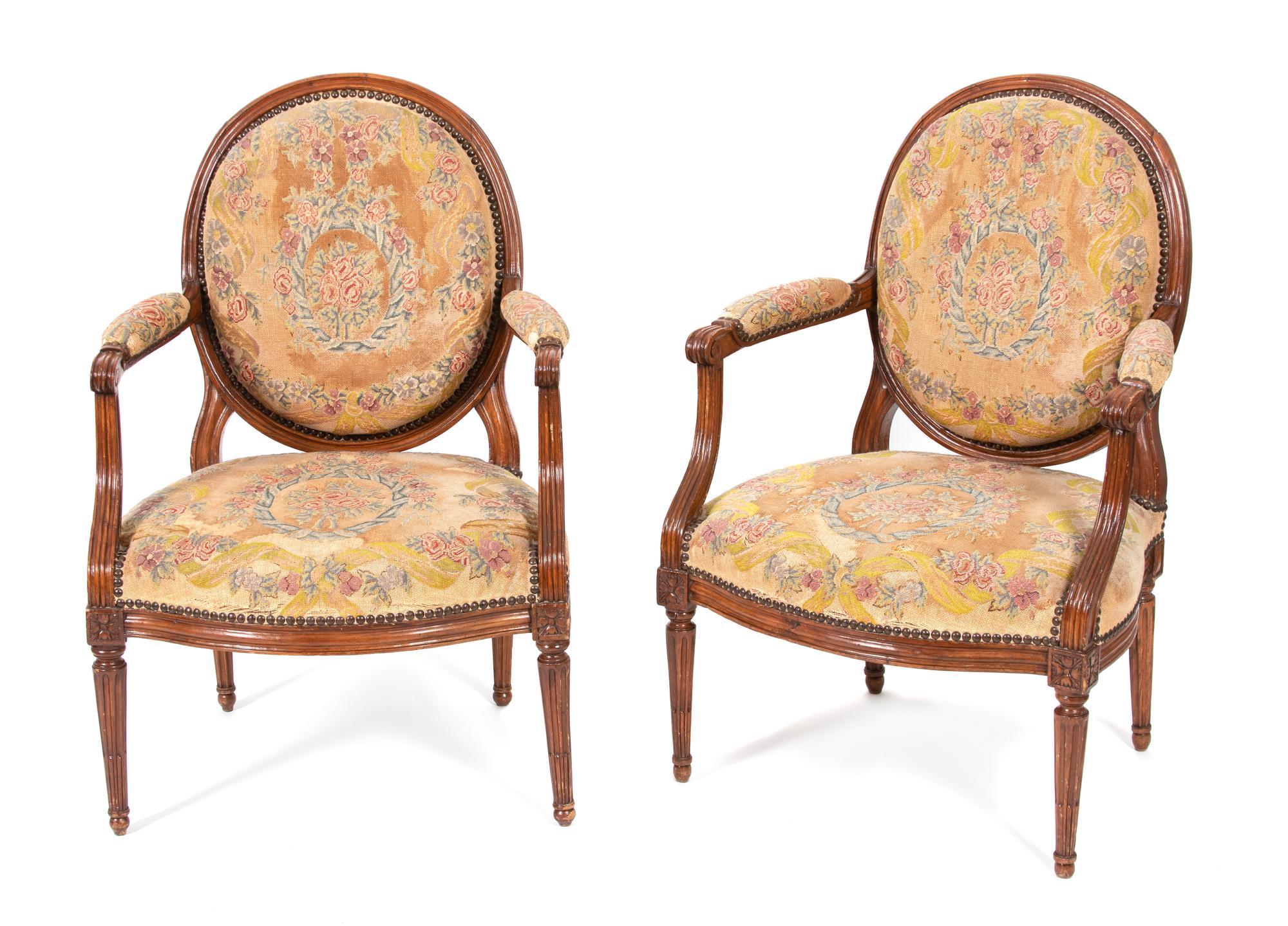 A Pair of Louis XVI Style Fauteuils Height 37 x width 25 x depth 19 inches. — EARLY 19TH CENTURY