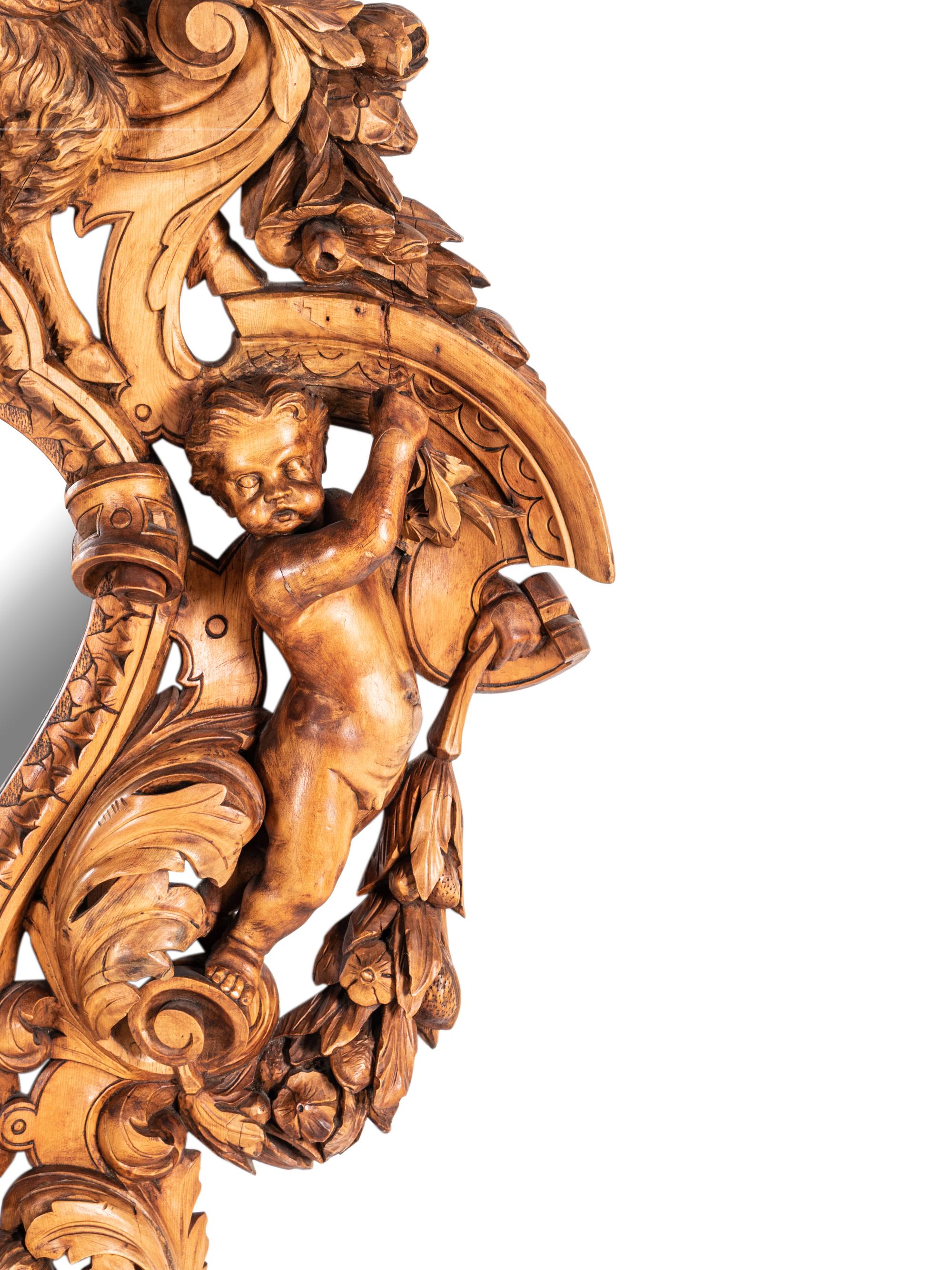 A Large Italian Carved Walnut Mirror in the Manner of Valentino Panciera Besarel