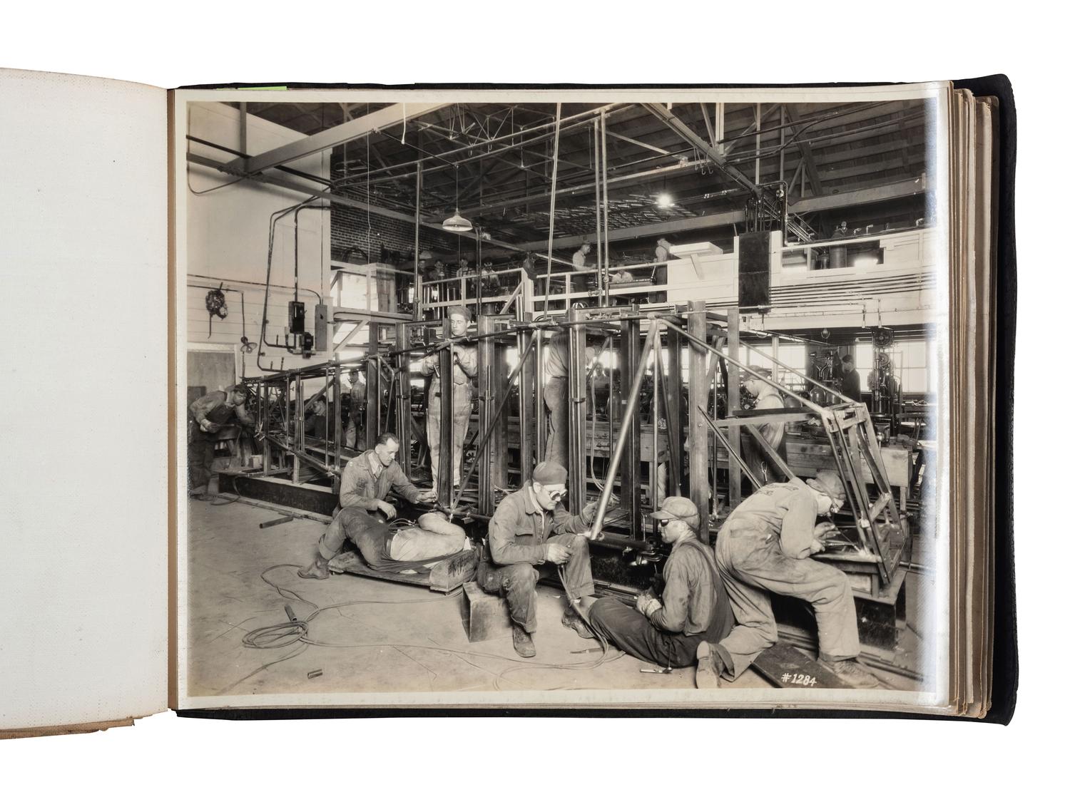 [AVIATION]. SMITH, Edgar B. (1896-1966), photographer. Rare photographic salesman aviation album documenting various airplanes and their construction at the plant of the Travel Air Manufacturing Company of Wichita, Kansas. Ca 1929.