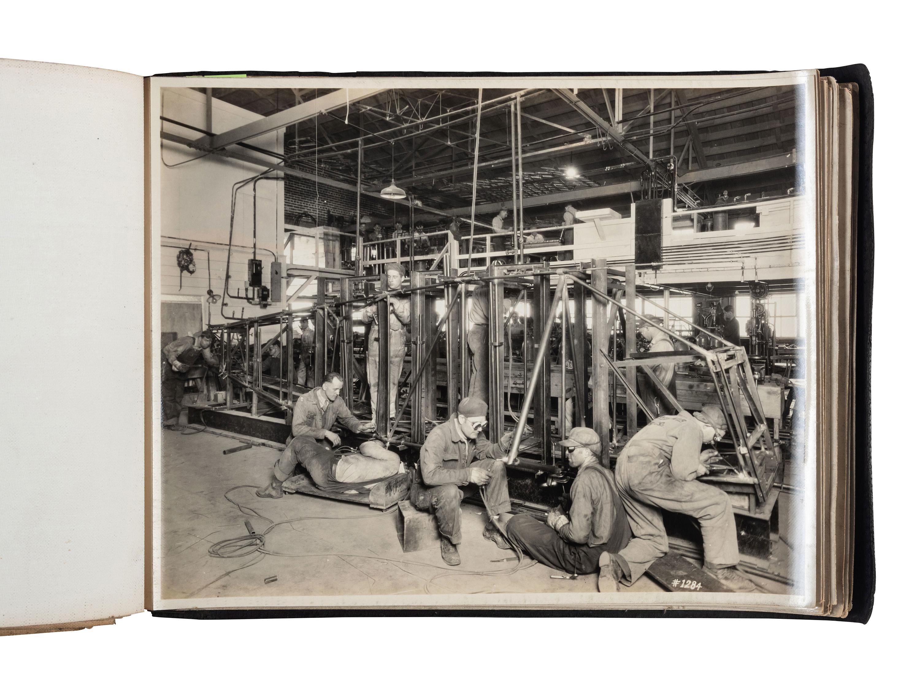[AVIATION]. SMITH, Edgar B. (1896-1966), photographer. Rare photographic salesman aviation album documenting various airplanes and their construction at the plant of the Travel Air Manufacturing Company of Wichita, Kansas. Ca 1929.