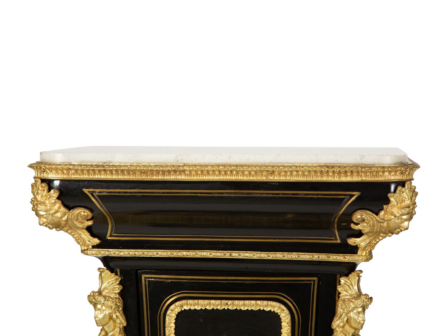 A Pair of Louis XVI Style Gilt-Bronze Mounted and Hardstone Inlaid Ebonized Marble-Top Pedestal Cabinets