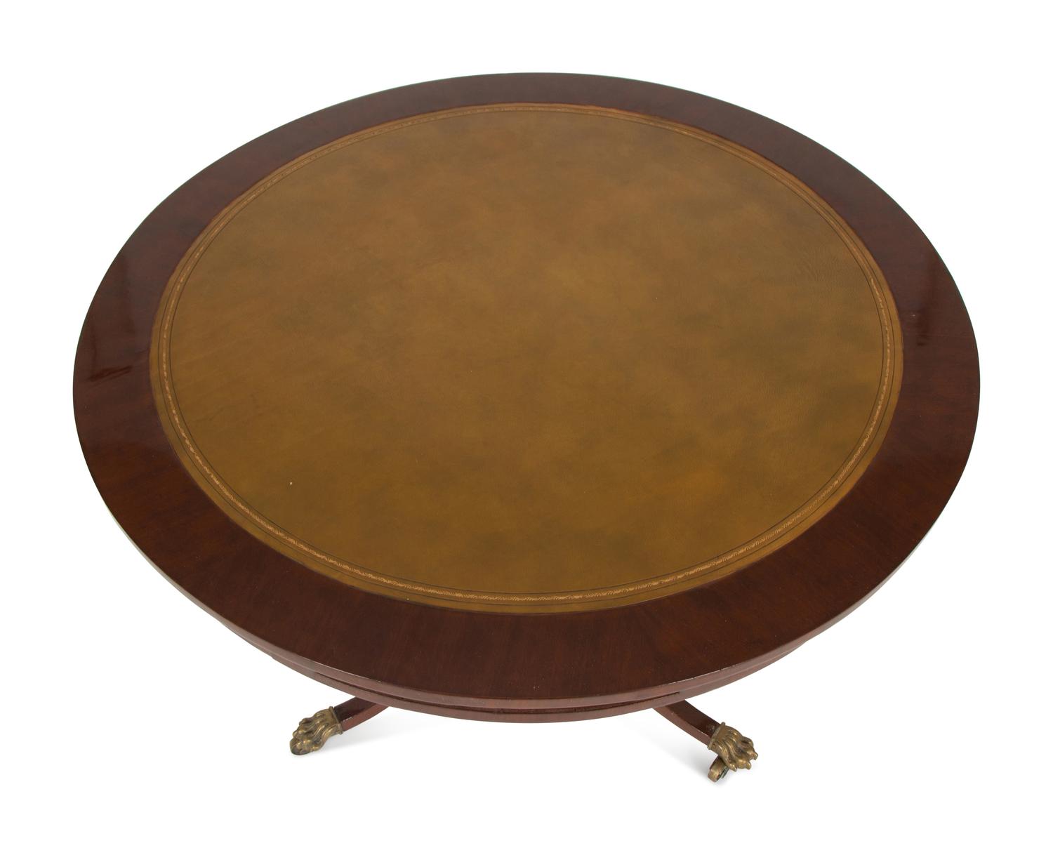 A Regency Style Mahogany Center Table with Inset Brown Leather Top — 20th Century