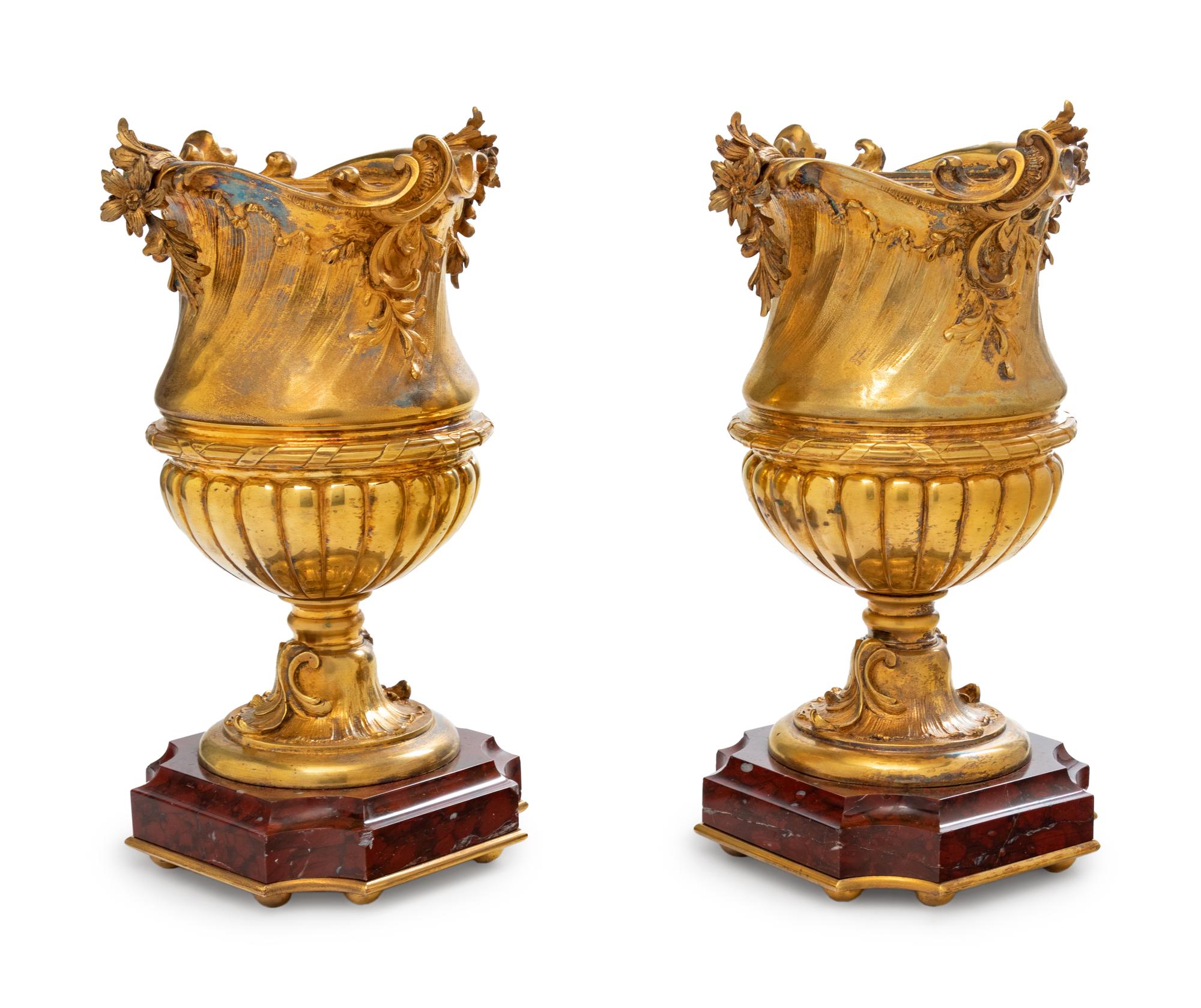 A Pair of Continental Gilt Metal and Marble Urns
