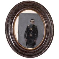 [EARLY PHOTOGRAPHY - PORTRAITURE]. A group of 6 folk art hand-painted tintypes of soldiers in uniform, comprising: