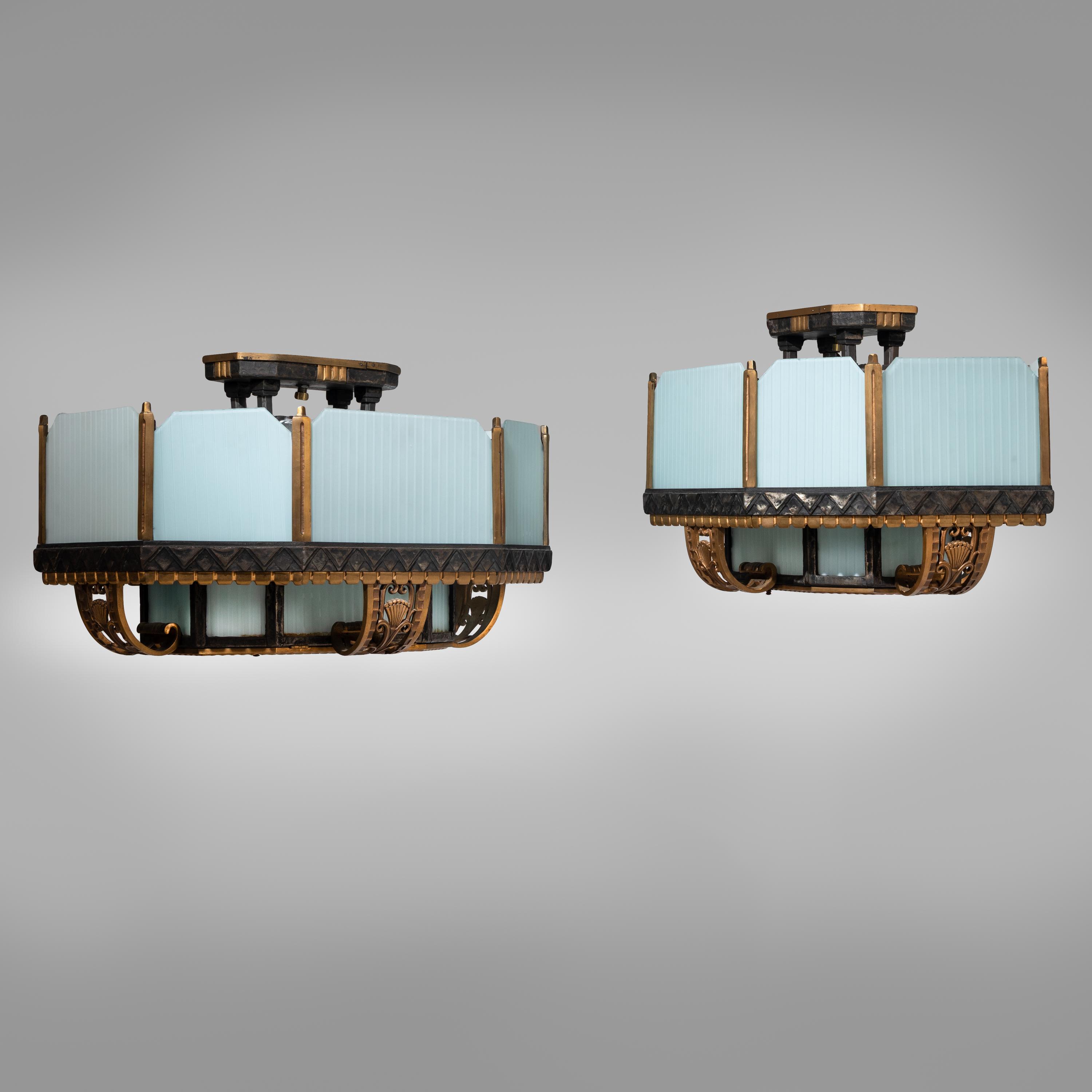 Art Deco Chicago, c. 1929 — Pair of Bronze and Glass Lighting Fixtures