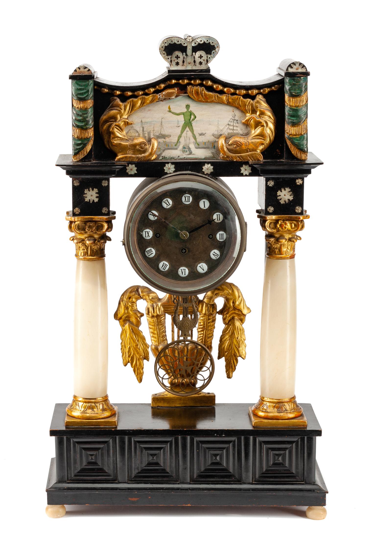 An Austrian Parcel Ebonized Mantel Clock