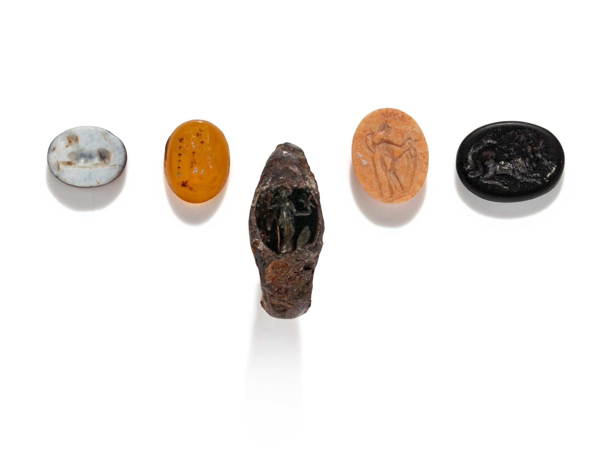 A Roman Iron Ring and Four Ring Stones