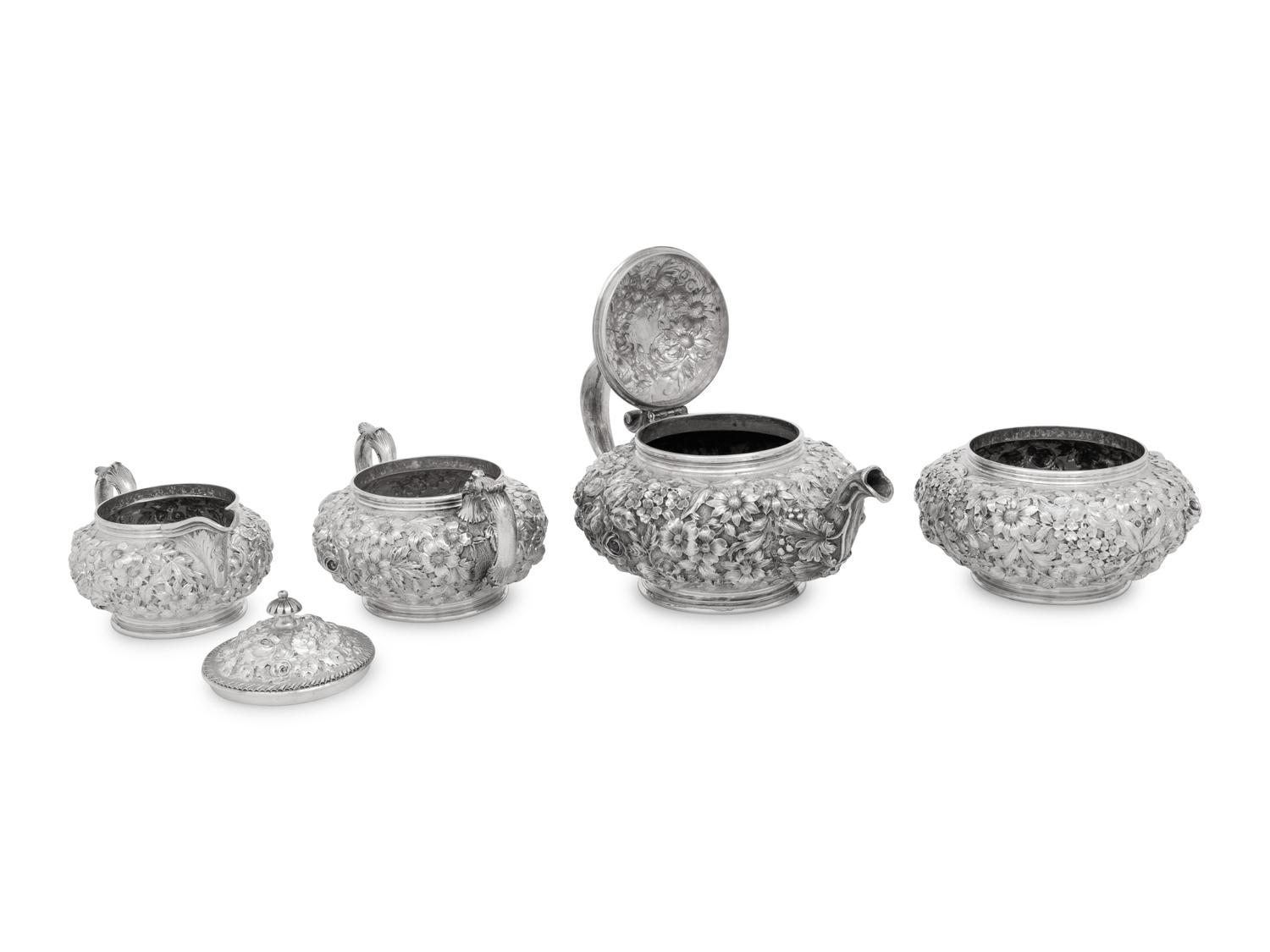 An American Silver Repoussé Four-Piece Tea Service