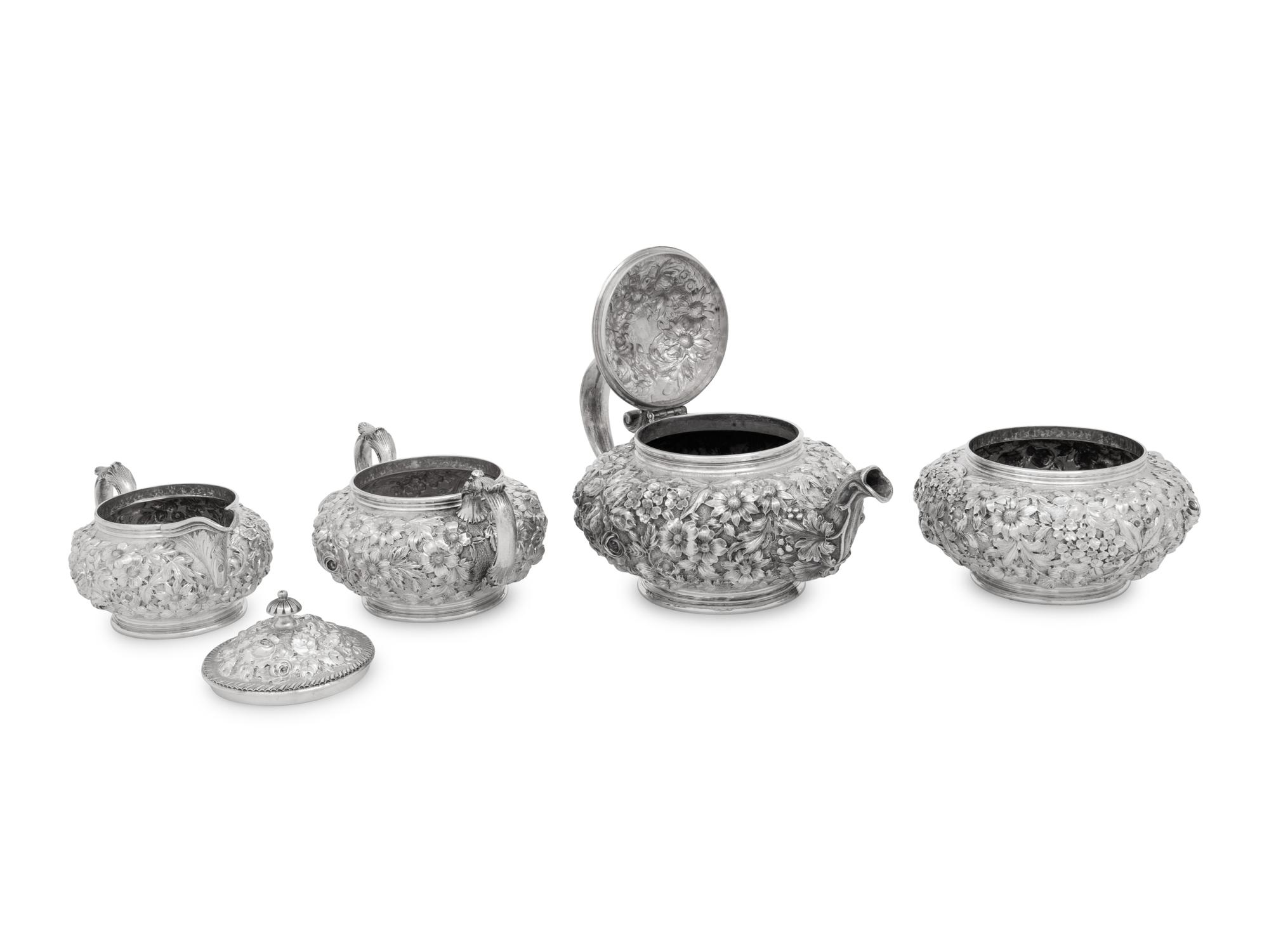 An American Silver Repoussé Four-Piece Tea Service