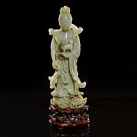 A large Chinese carved celadon jade figure of a bodhisattva 青玉雕觀音 Late Qing to Republic period ?????