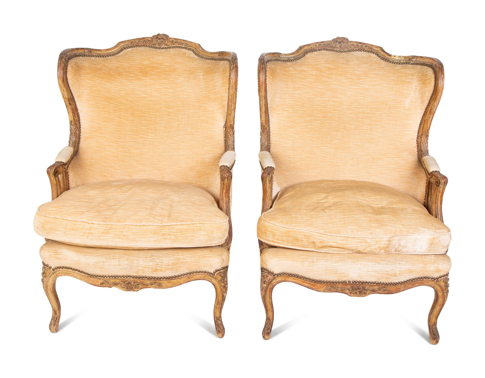 A Pair of Louis XV Style Giltwood Bergères a Oreilles — 19TH CENTURY