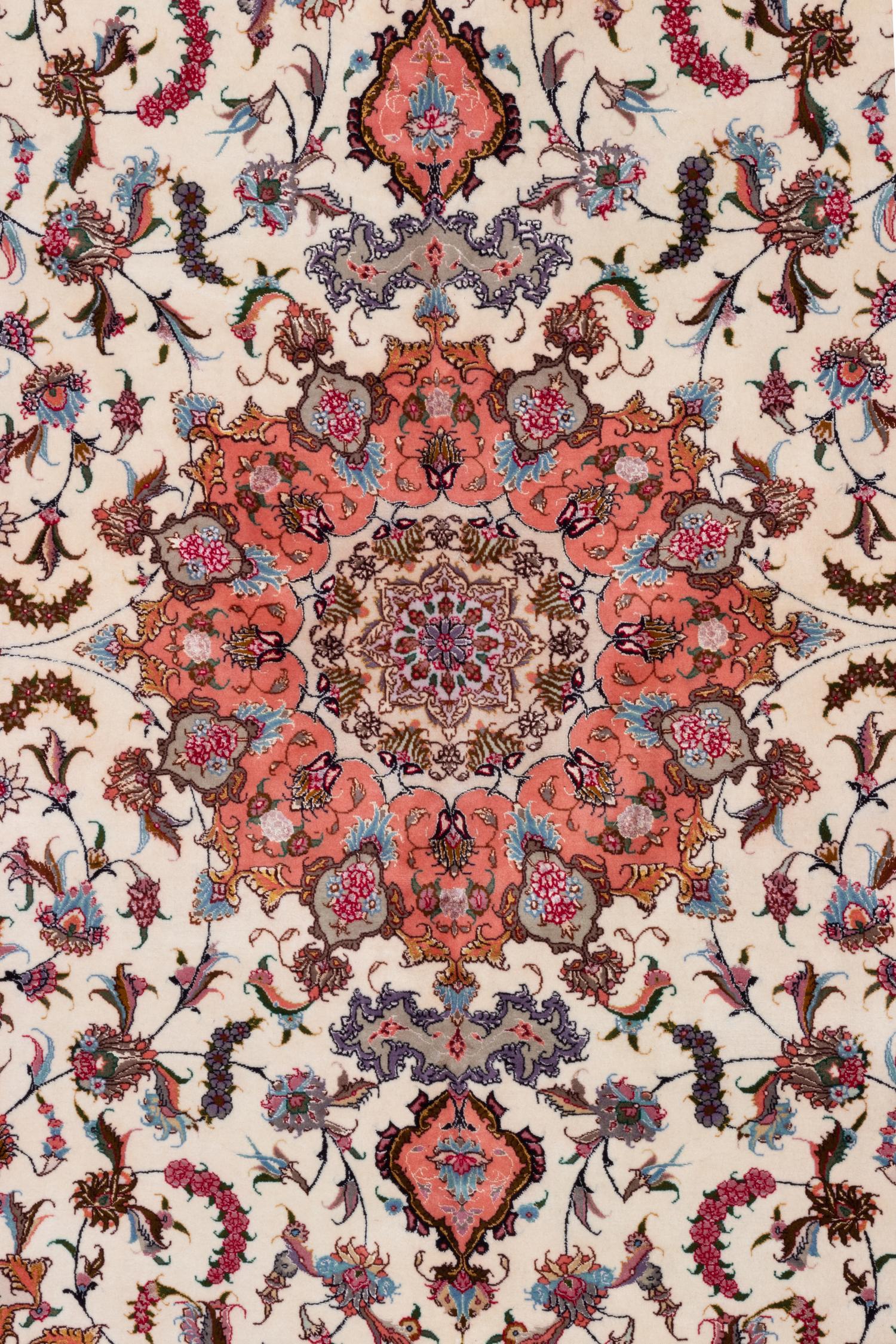 A Tabriz Silk and Wool Rug