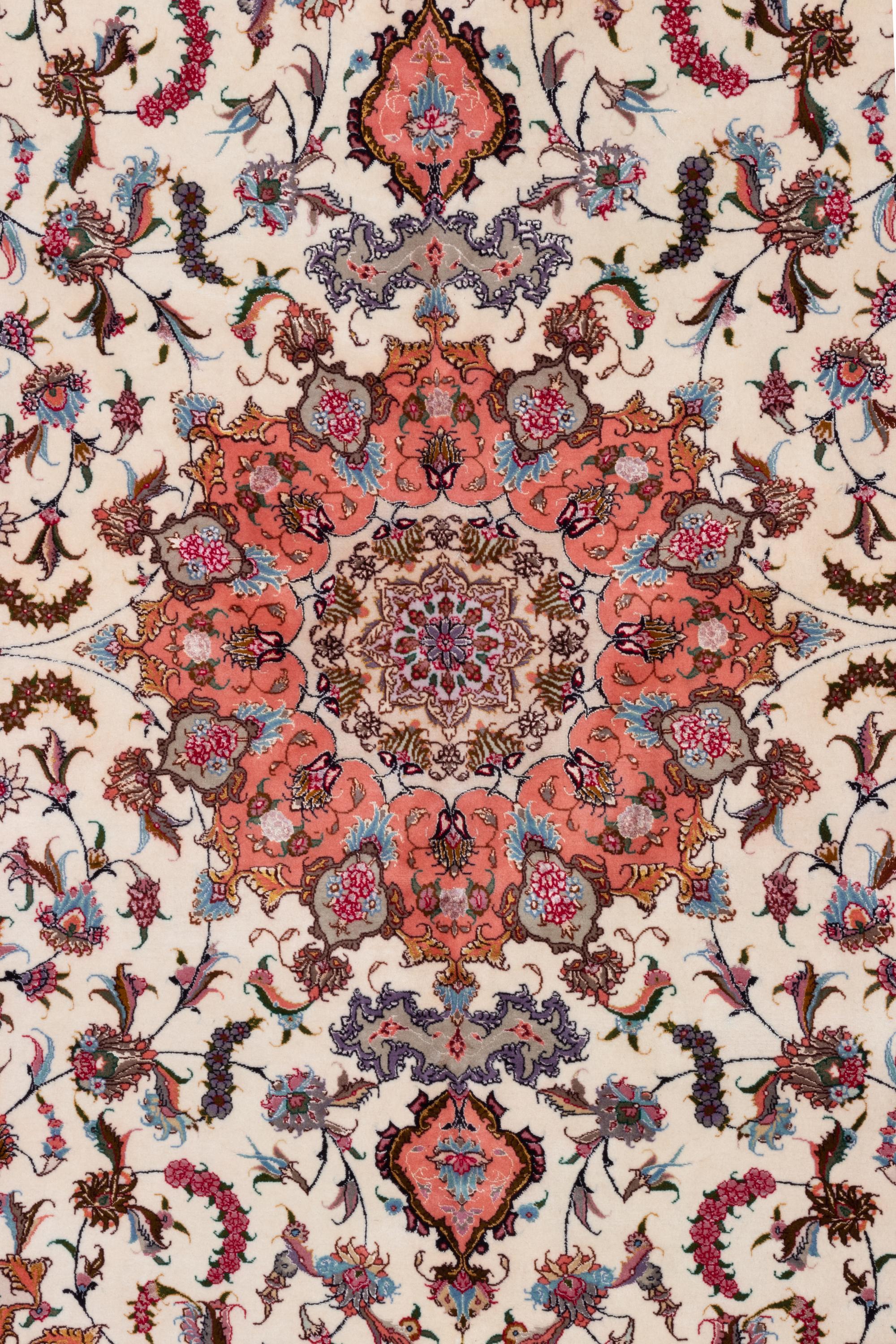 A Tabriz Silk and Wool Rug