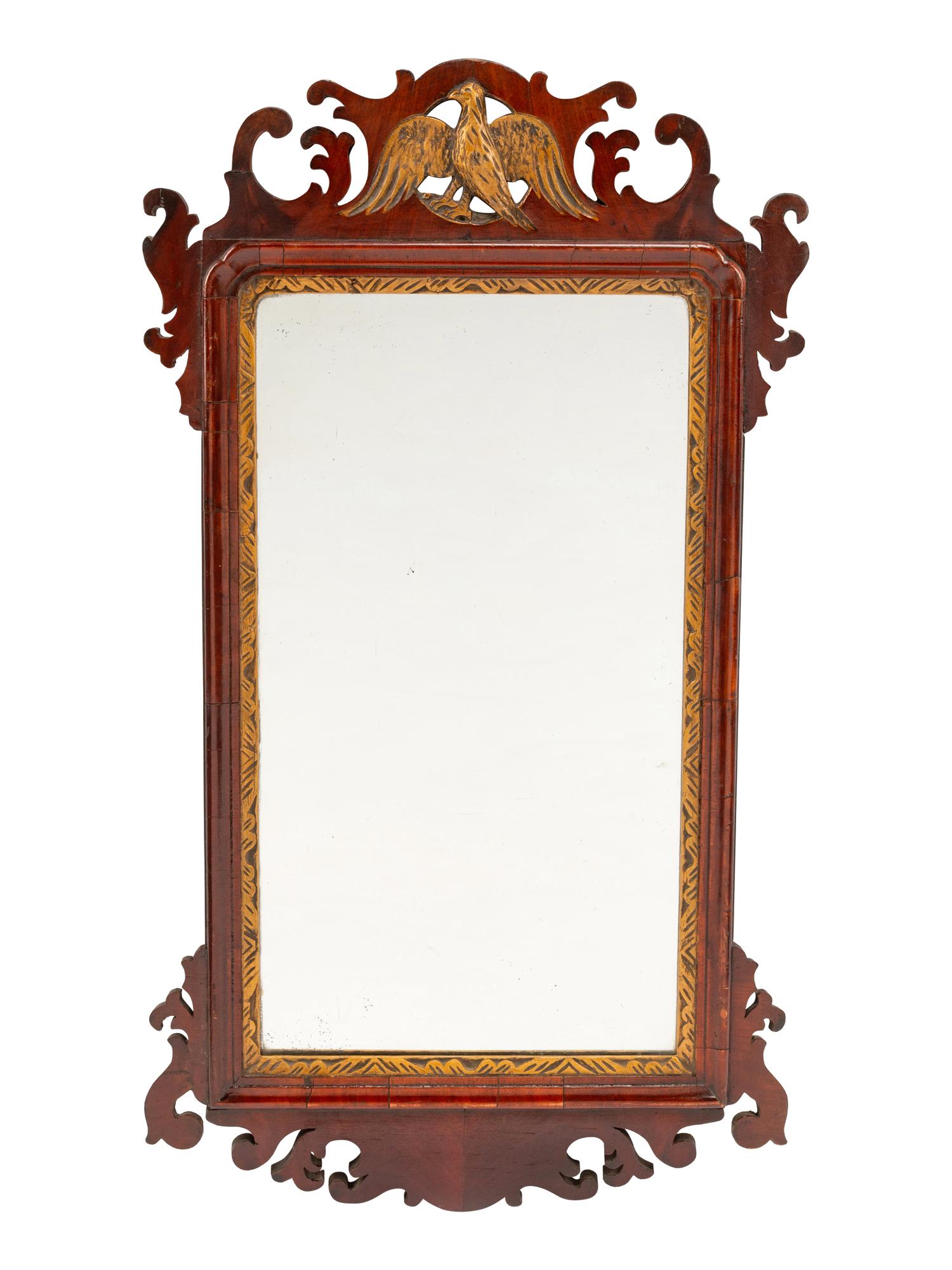 A George III Style Parcel Gilt Mahogany Mirror