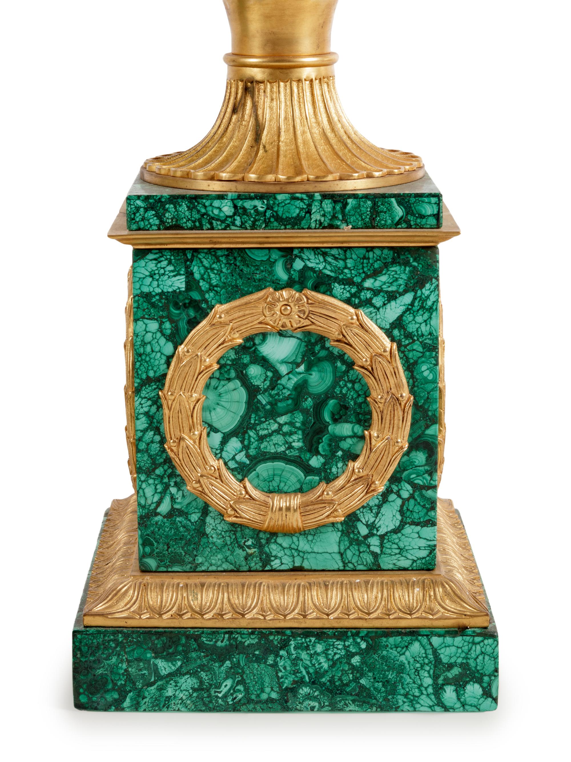 A Pair of Empire Style Gilt Bronze Mounted Malachite Veneered Urns