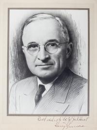 (TRUMAN, HARRY) Album of autographed photographs of Truman, his cabinet and other Washington contemporaries. 32 photos total.