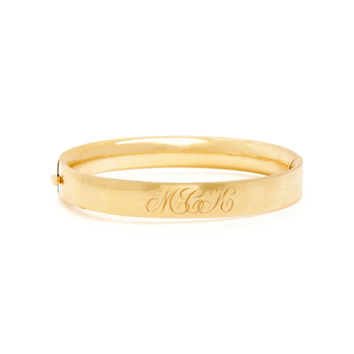YELLOW GOLD INITIAL BROOCH AND MONOGRAMMED BANGLE