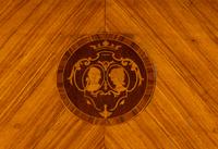 An Italian Fruitwood and Marquetry Demilune Commode