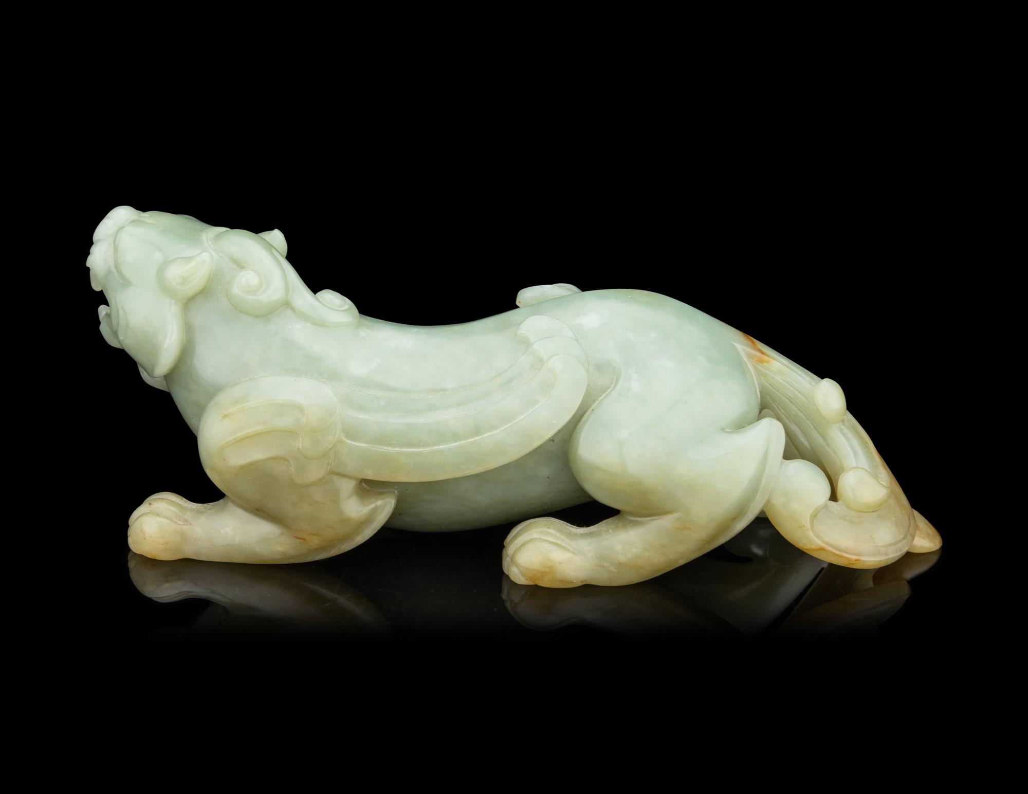 A Chinese Celadon Jade Figure of a Mythical Beast