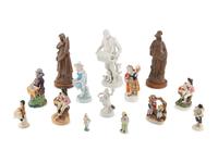 A Group of Fourteen Street Organist Figurines