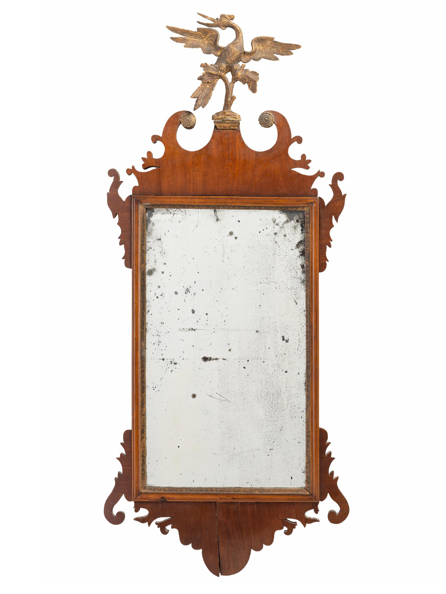 A Chippendale Carved and Parcel Gilt Mahogany Looking Glass