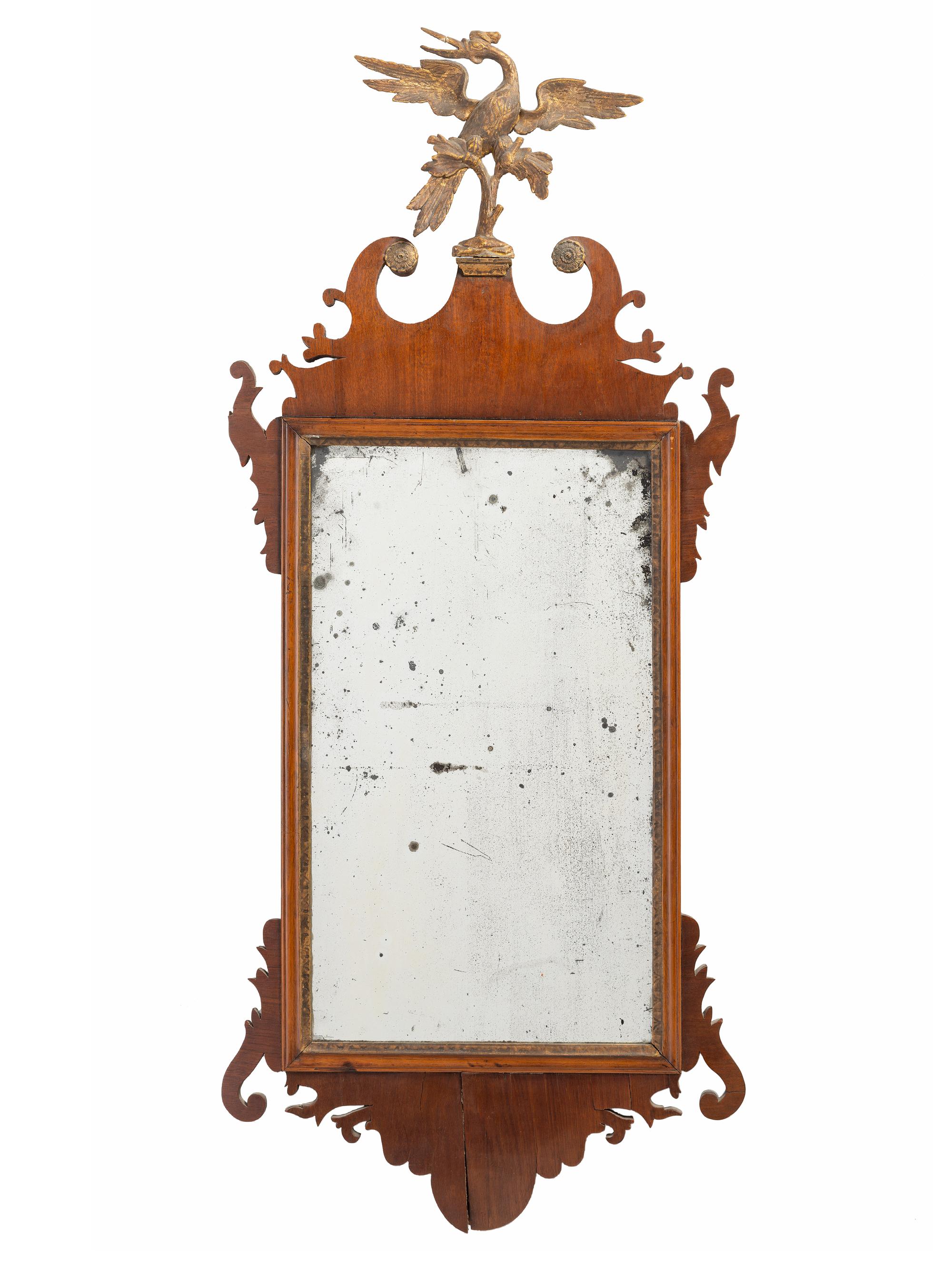A Chippendale Carved and Parcel Gilt Mahogany Looking Glass