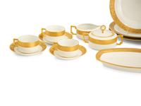 A Bavarian Gilt Decorated Porcelain Dinner Service