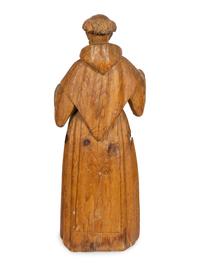 A Continental Carved Santos Figure