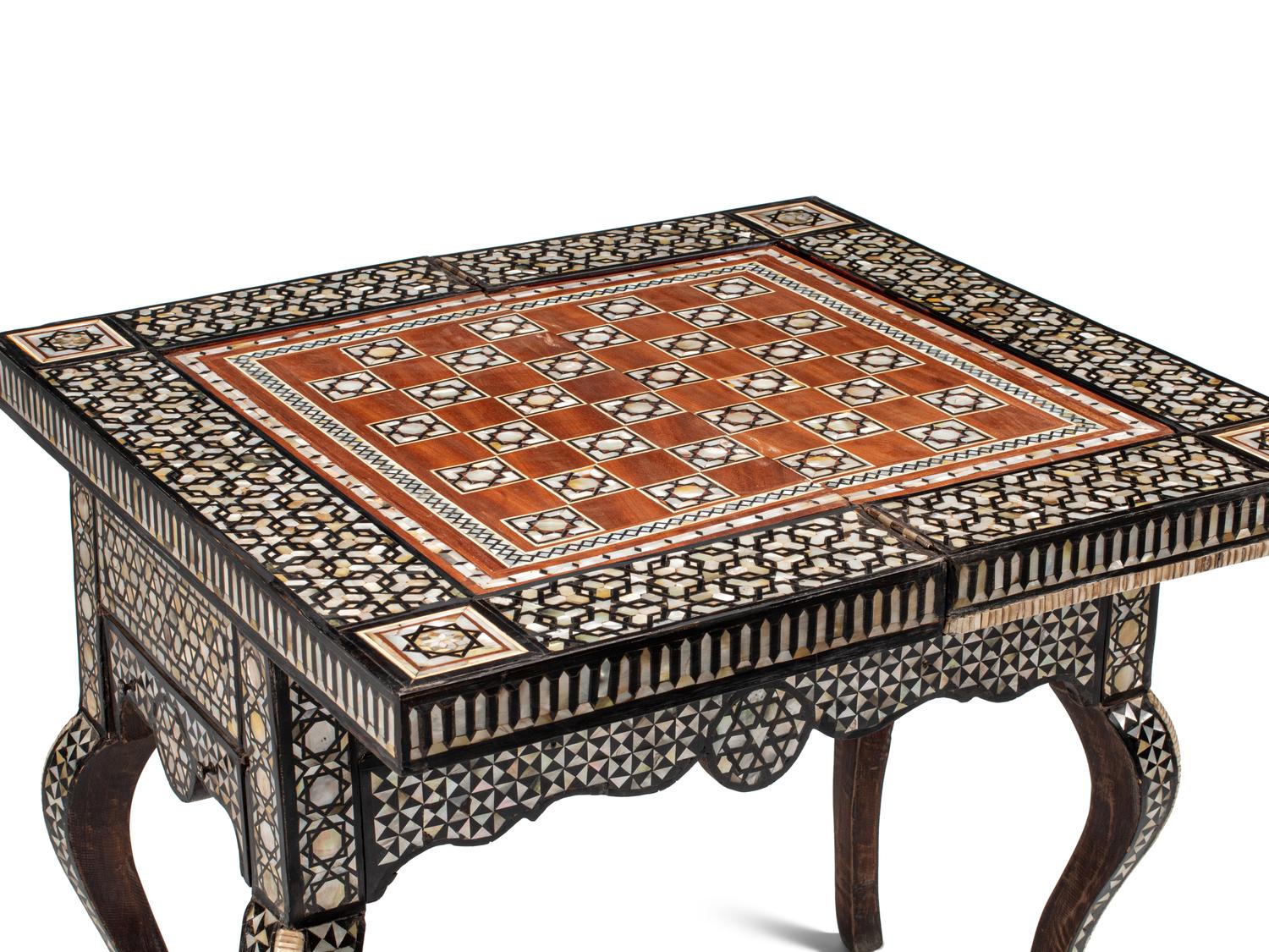A Levantine Marquetry and Mother-of-Pearl Inlaid Flip-Top Swivel-Action Game Table