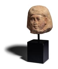 An Egyptian Painted Limestone Portrait Head of an Official