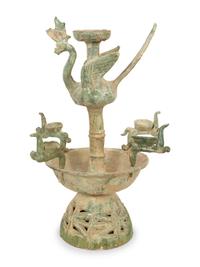 A Han Pottery Phoenix Oil Lamp
