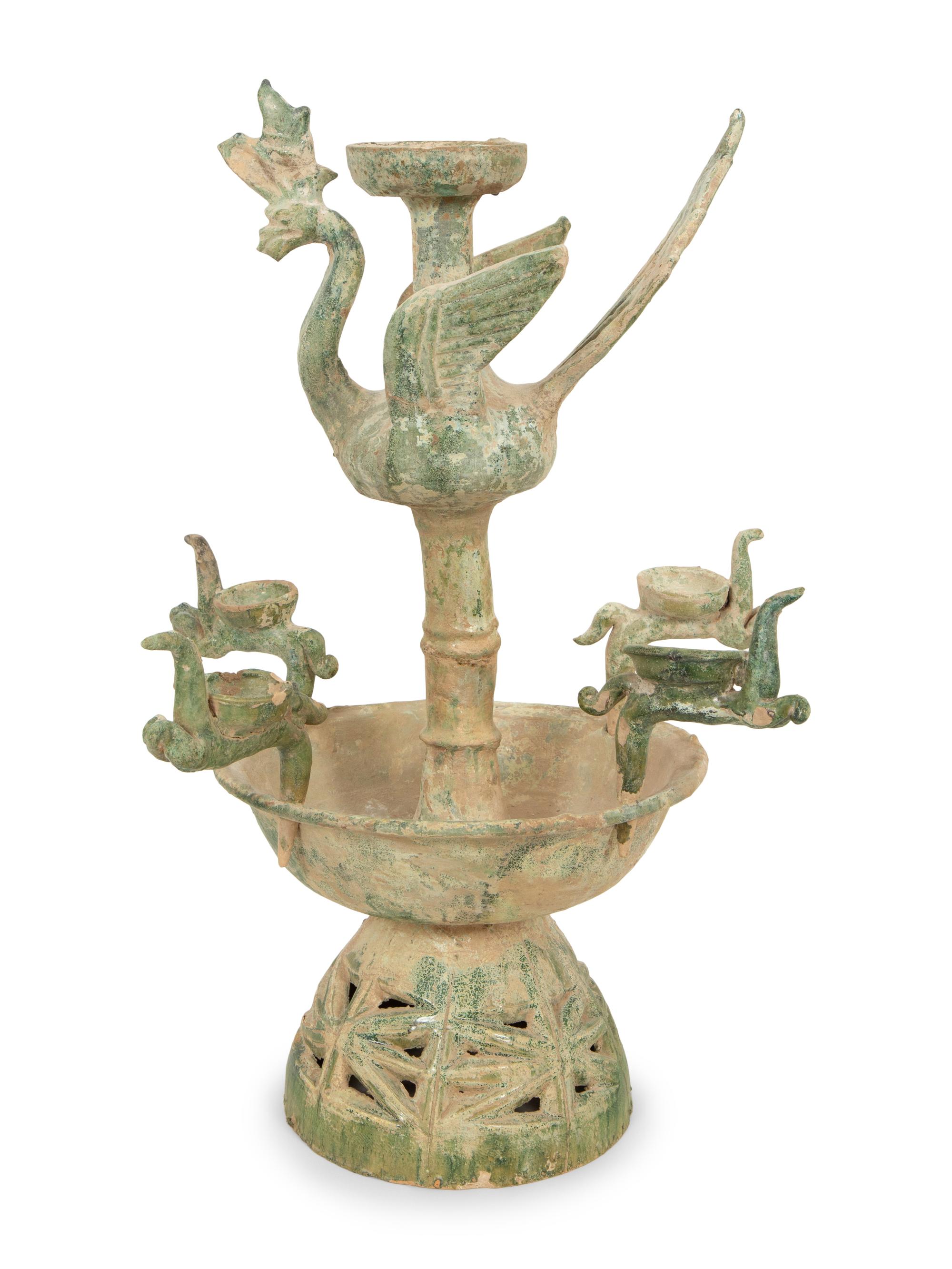A Han Pottery Phoenix Oil Lamp