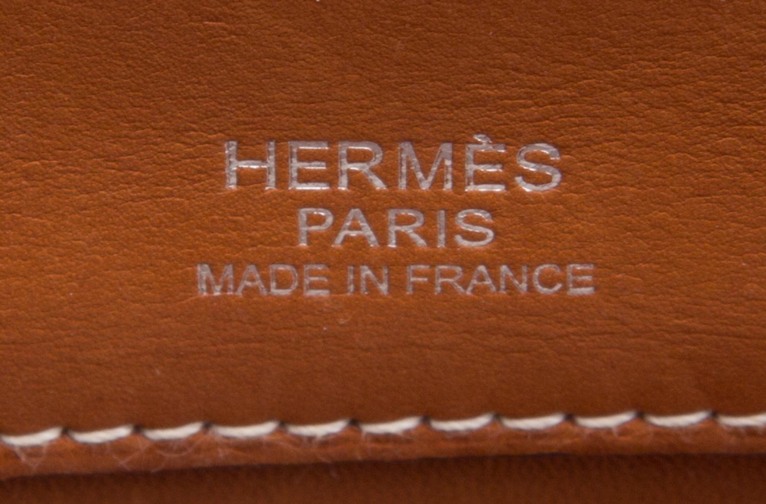 An Hermes Brown Leather and Canvas 35cm Atlas Handbag, 14" x 12" x 5".
