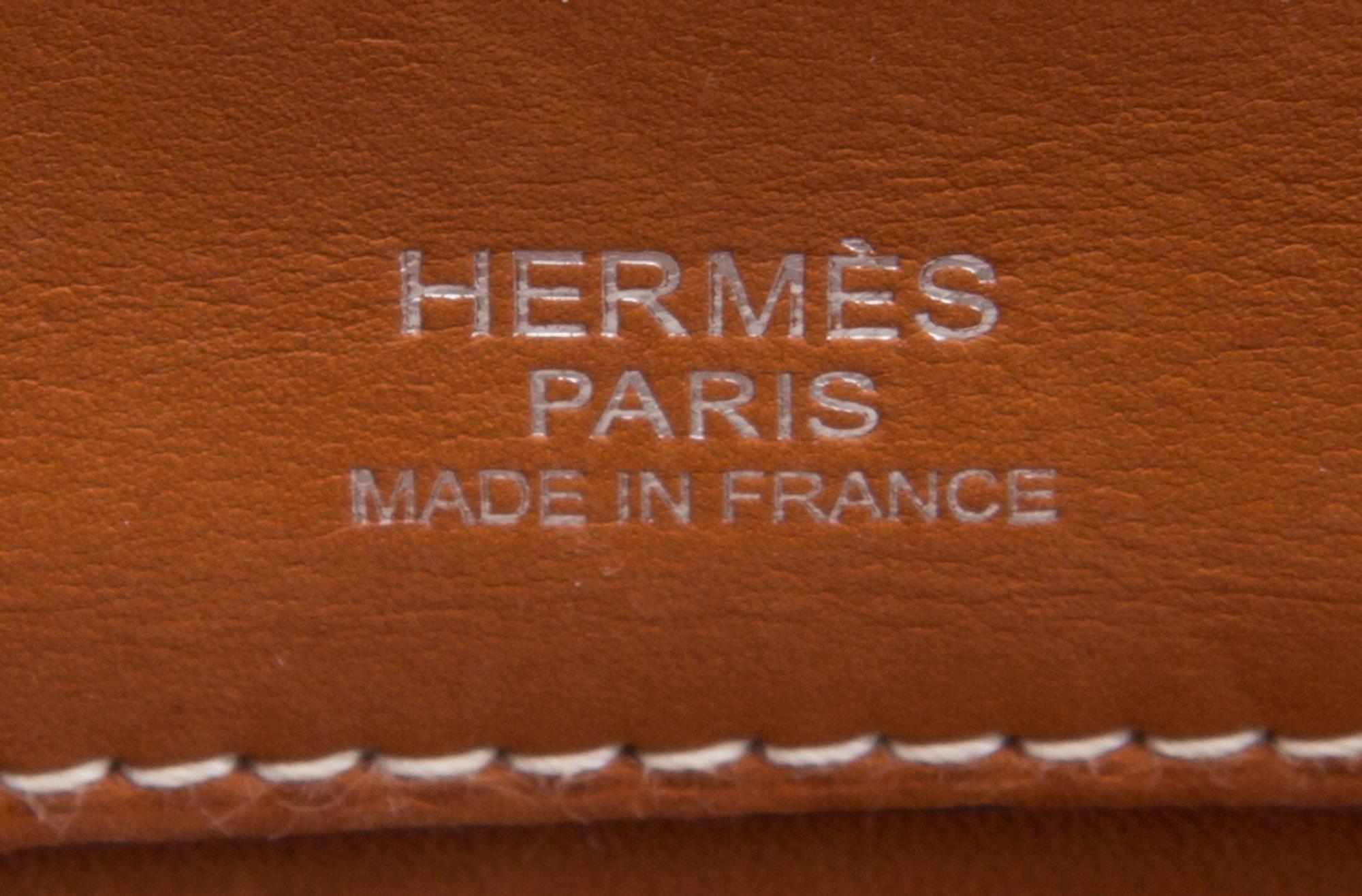 An Hermes Brown Leather and Canvas 35cm Atlas Handbag, 14" x 12" x 5".