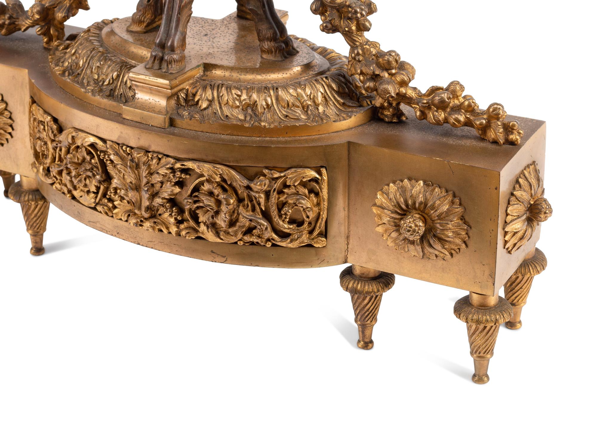 A Pair of Louis XVI Style Gilt Bronze Chenets