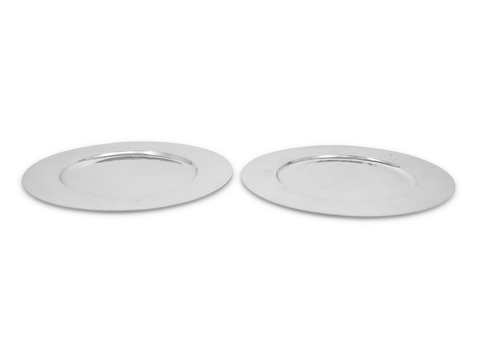 A Pair of Porter Blanchard Silver Chargers