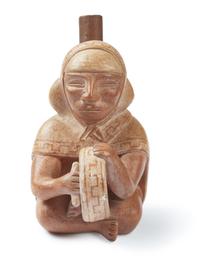 A Moche Stirrup Vessel in the form of a Shaman Drummer